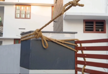 தக்கலை: சிதிலமடைந்த மின்கம்பம்; கயிற்றால் கட்டிய மின்வாரியம்