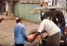 மார்த்தாண்டம்: தனியார் வங்கி முன் மகனுடன் பெண் போராட்டம்