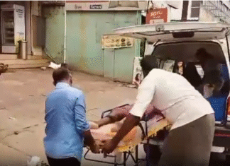 மார்த்தாண்டம்: தனியார் வங்கி முன் மகனுடன் பெண் போராட்டம்