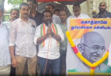 திருவட்டாறு: கொட்டும் மழையில் காங்கிரஸ் ஆர்ப்பாட்டம்