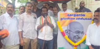 திருவட்டாறு: கொட்டும் மழையில் காங்கிரஸ் ஆர்ப்பாட்டம்